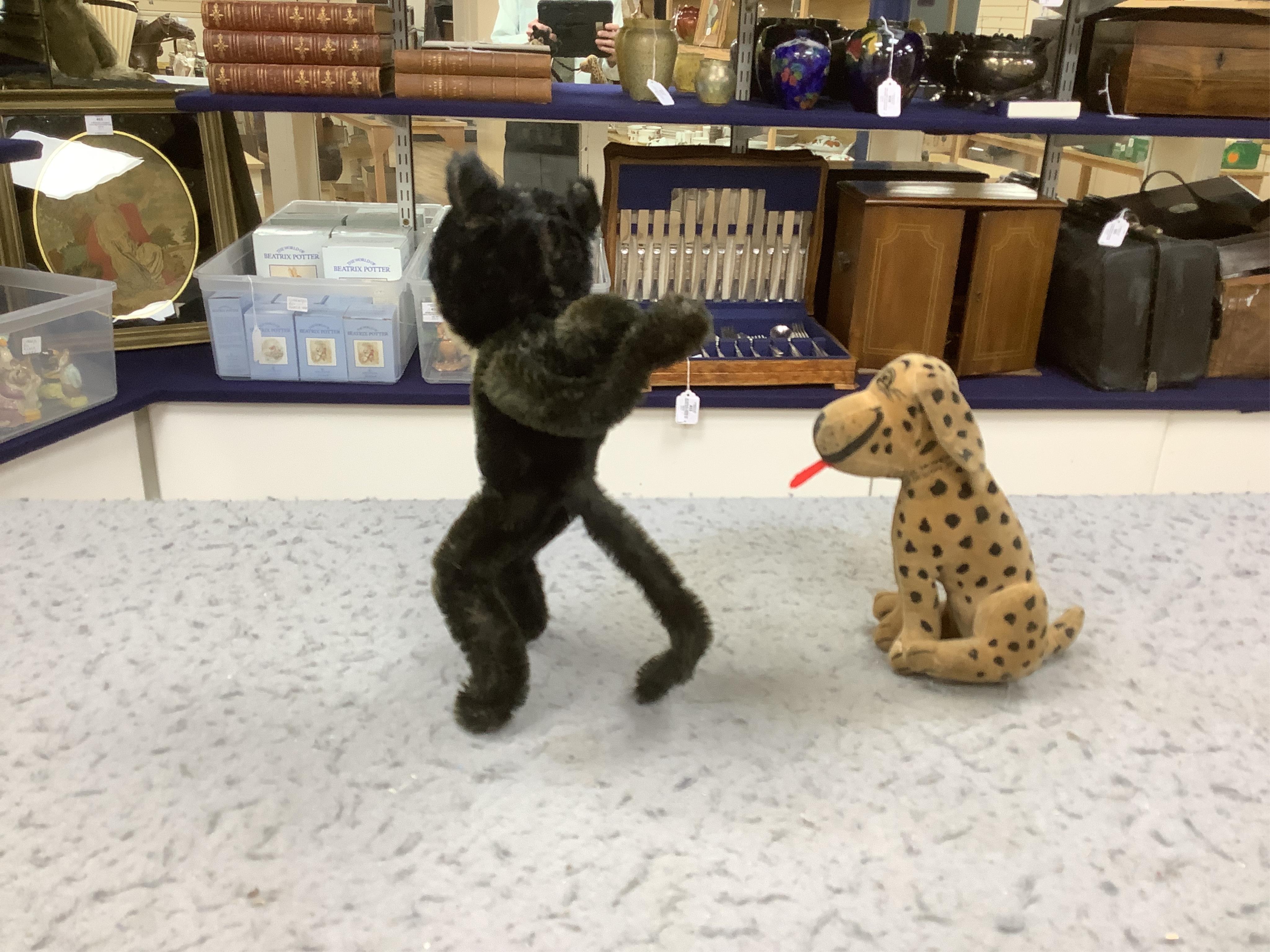 An unusual cheerful Desmond Deans rag book, c.1920's, 14cm high, good condition but a little grubby, and an Alpha Farnell Felix the Cat, 20cm high (2). Condition - good